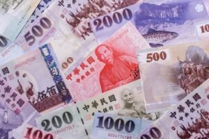 Taiwan, Taiwanese paper banknotes and coins, dollars of various denominations. Taiwanese dollars